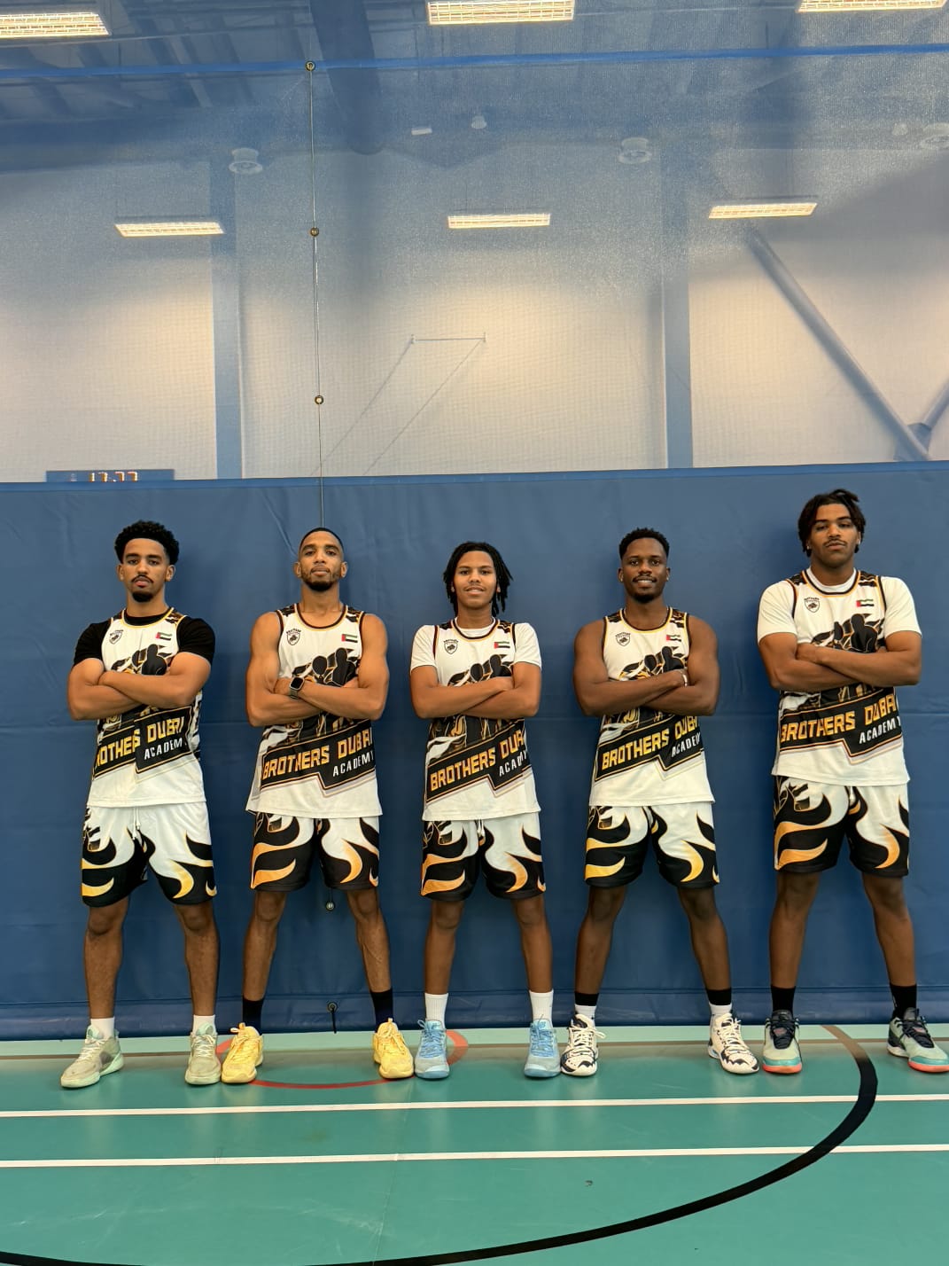 Brothers Dubai Academy coaches lined up on court